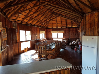 Open-plan lounge and dining area at Mhlangeni Bush Camp
