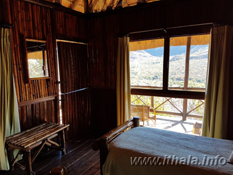 Wooden bedroom with scenic views at Mhlangeni Bush Camp in Ithala Game Reserve