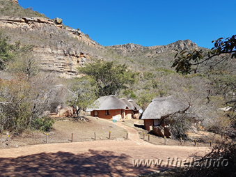 Ntshondwe Camp chalets beneath the mountains of Ithala Game Reserve