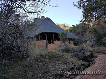 Exterior of a six-bed thatched chalet at Ntshondwe Camp in Ithala Game Reserve
