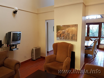 Comfortable lounge inside a six-bed self-catering chalet at Ntshondwe Camp