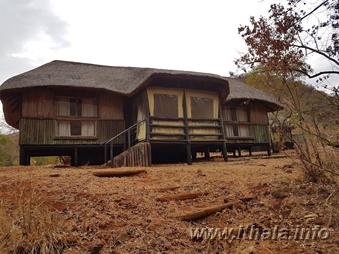 Raised wooden accommodation cabins at Mbizo Bush Camp